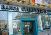 Fuziunea dintre Banca Comercială Carpatica şi Patria Bank se prelungeşte