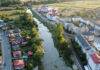 În Târgu Lăpuș – lucrări de decolmatare și amenajare a albiei râului Lăpuș